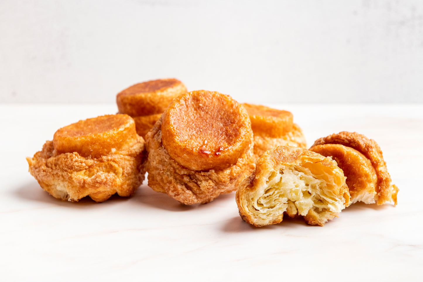 a Breton pastry that features a crispy, caramelized crust on the outside with a flaky and tender crumb within