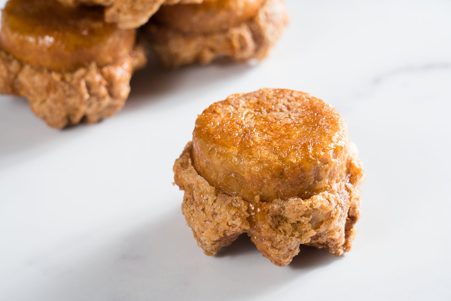 Close up of BROWN SUGAR DKA (Dominique's Kouign Amann)