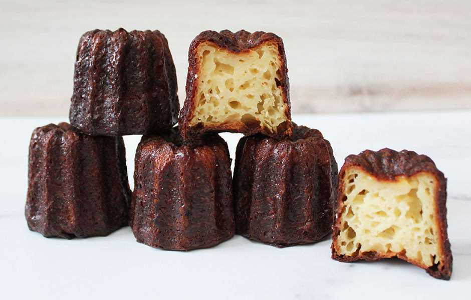 Close up of Dominique Ansel Bakery 5pc cannele de bordeaux