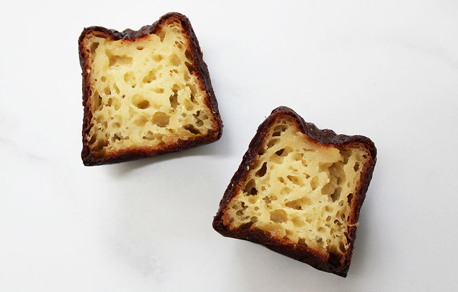 Dominique Ansel Bakery 5pc cannele de bordeaux cut open