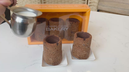 Video of milk being poured into cookie shots